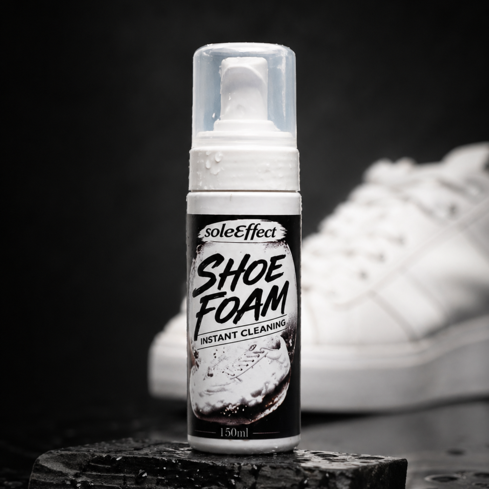 Bottle of soleEffect Shoe Foam with a white sneaker in the background